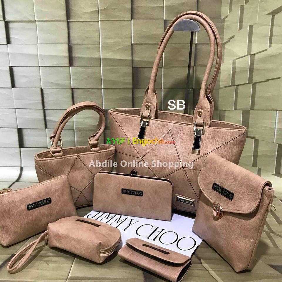 Jimmy choo 7pcs Combo Famous model Double zip handbag Sling🤘 Wallet💰  Mobile sling🤳 Coin pouch💸 Card holder 💳 All your needs would be a… |  Instagram