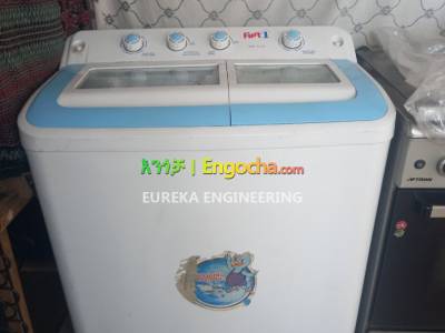first 1 - washing machine (12 Kg) / ልብስ ማጠቢያ