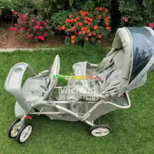 የመንታ/ሁለት ህፃናት ማጕጕዣ ጋሪ/መመገቢያ Graco Duo Glider Stroller Price in Ethiopia